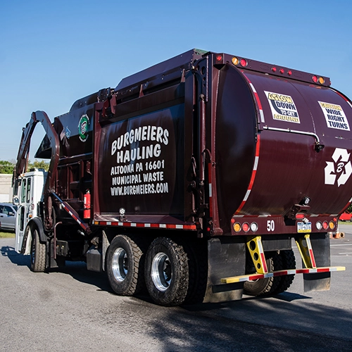 Back-of-Burgmeiers-Trash-Truck Burgmeier's Hauling Truck